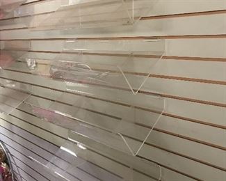 Acrylic shelves - large are 26” wide and small are 16” wide. All are 10” deep.