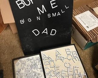 Magnetic sign with small and large letters.