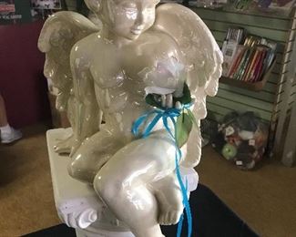 A glazed porcelain Angel on a Roman column!