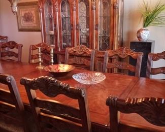 Broyhill dining table , 6 leaves, 14 chairs, China cabinet.