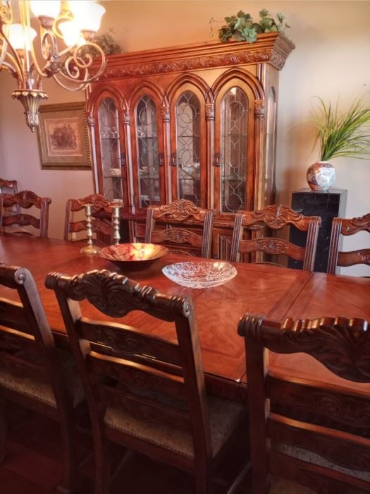 Broyhill dining table , 6 leaves, 14 chairs, China cabinet.