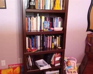 One of several wooden bookcases
