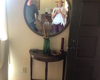 Antique gilded mirror and Demilune table