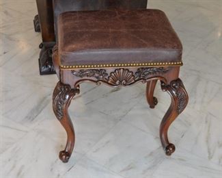 One of the Two Carved Mahogany Benches with Distressed Brown Leather and Nail Head Design
