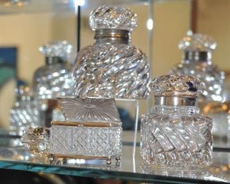 Close-up View of a Sample of the Antique Inkwells, Vanity Jars as well as a Stueben Frog Paperweight Hand Warmer