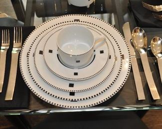 Fabulous Swid Powell "Tuxedo" 5 Piece Place Setting for 8 (Two Sets Available) shown with one of the Mid-Century Modernist 5 Piece Place Settings for 10 by Y. Kono Vignelli for Sasaki