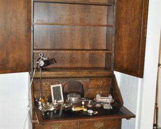 Mirrored Doors Open to 4 Shelf Bookcase!