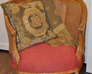 Wood and Cane Armed Chair, Cushioned Seat, 33"w x 38"h x 28"d.  Shown with Anichini Pure Wool Blanket/Throw and Pillow from Gerry Nichol, Inc. NY