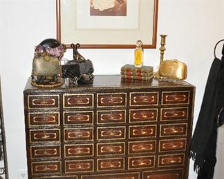 Leather Chest on Ball Feet, 36"w x 42"h x 14"d .  This Rare Item has Small Drawers marked A-YZ with 9 more Drawers.  Brass Hardware.