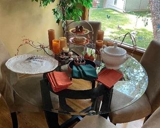 Glass topped kitchen table with 4 chairs