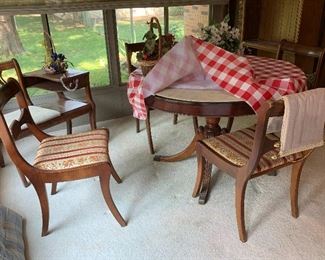 Duncan Phyfe Table, one leaf, 6 matching chairs, one extra chair that is not a perfect match but covered in same material, and table pads - Table and Chairs Gorgeous!
