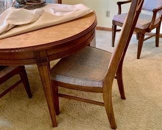 Dining Room Table 4 regular chairs, 2 captains chairs, table pads…..all in excellent condition