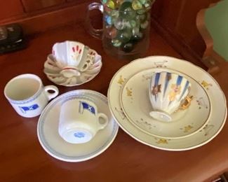 Antique marbles, and tea cups