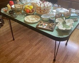 Vintage table with four chairs that are outside