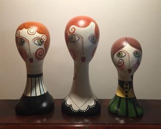 Vintage papier-mâché heads.