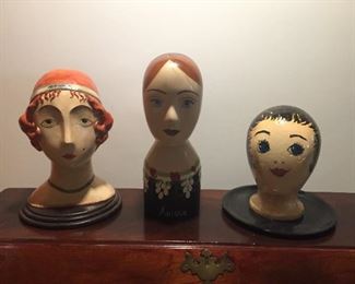 Vintage papier-mâché heads.