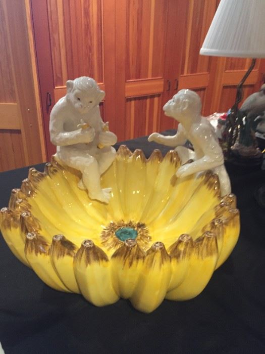Unique ceramic banana bowl with monkeys.