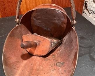 Coal bin with scoop.