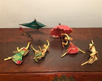 Mobile with papier-mâché figures.