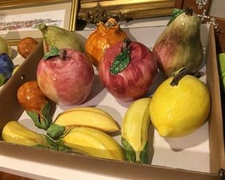 Glazed ceramic fruit.