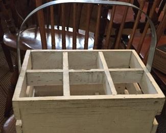 Wooden bottle holder with handle.