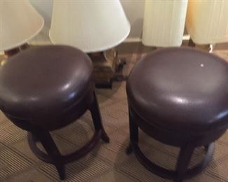 Set of four swivel stools.