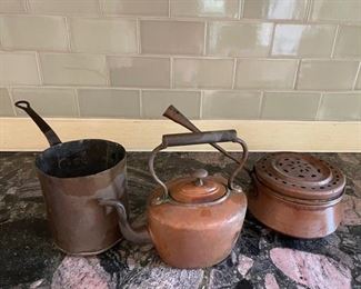 Vintage copper cooking pots.