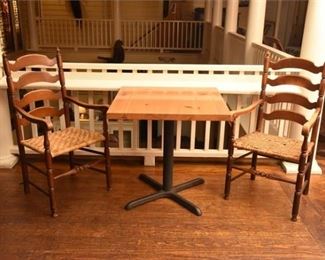 Table and Two Ladder Back Chairs