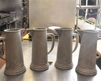 Four Metal Pitchers