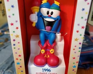 Izzy Olympics new in box coin bank