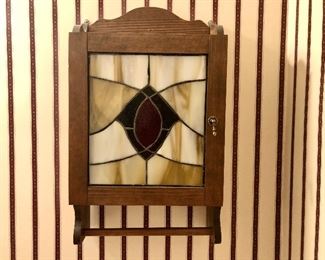 Towel holder with leaded glass