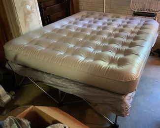Queen size air mattress on platform 
