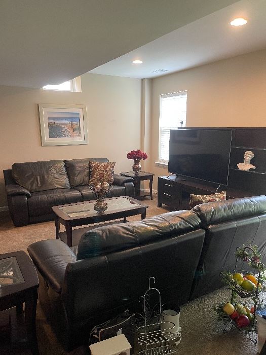 Black brand new leather electric reclining couches in excellent condition
700 each