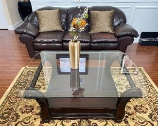 Square glass top wood base coffee table 