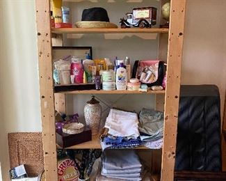 Assorted creams, bathroom items, lotions, Womans shorts size 4 