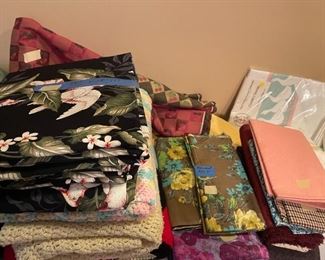 linens and yards of fabric, some is chintz
