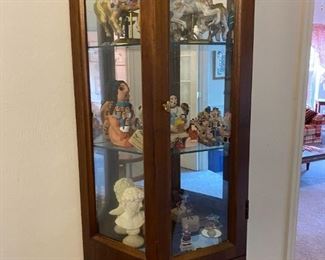 Lighted Curio cabinet and pueblo clay art