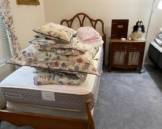 Excellent twin mattress, like new and never really slept on, matching twin head and foot boards, Could be used separate or as a King