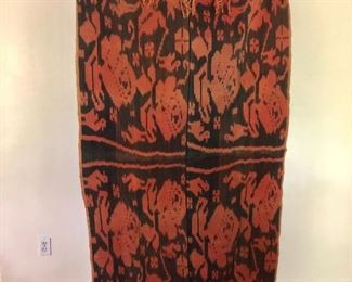 $75 Sumba textile, washed black with red design. 70.25" L x 39.5" W.