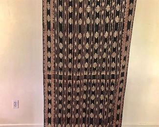 $120  Savu textile, black with beige patterns and reddish stripes. 69.25" L x 31.5" W.
