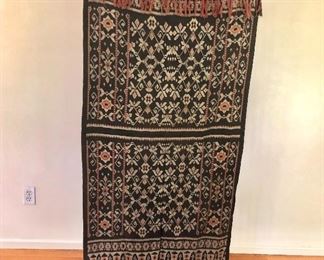 $120 Flores textile, black, gray, and light red. 59.5" L x 29.5" W.