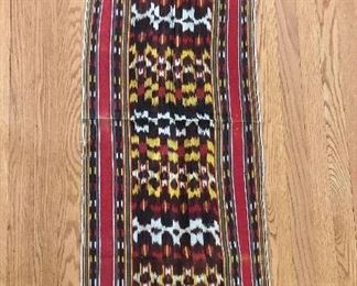 $30 Flores textile, brown, red, yellow, white. 45" L x 18" W.