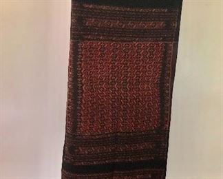$75 Flores sarong, black with red patterning. 63" L x 26" W.