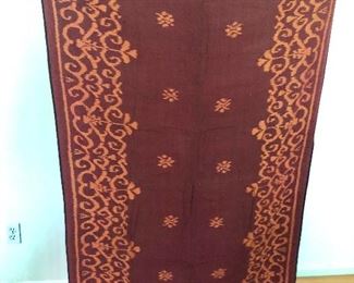 $85   Large textile , brown with orange patterning. 52.75" L x 18" W.