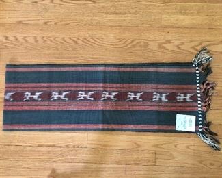$45 Textile  black with red stripes, with red and white central stripe. with label 51" L x 22" W.