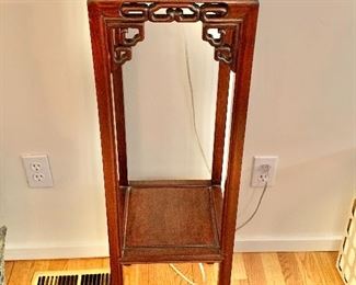 $180   Carved rosewood stand.   40" H, 12" W, 12" D. 