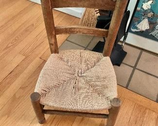 $50 Vintage rush and wood child's chair, 22" H x 12" W x 11" D x 10.5" seat height.