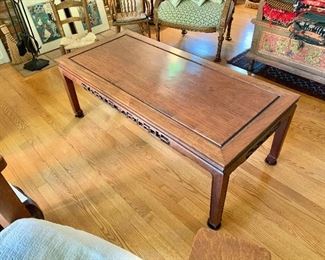 $275  Vintage rosewood coffee table, 17" H x 48" W x 22" D.