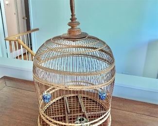 $175  Vintage bird cage with blue and white ceramic vases.  27" H, 14.5" diam.  
