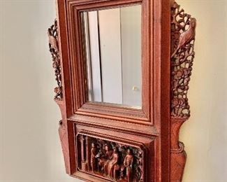 $195  Vintage rosewood carved mirror.  22" H x 17" W.  
